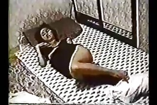 एक टैंक टॉप में